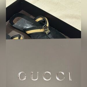 Vintage Gucci thong sandals in black/gold web